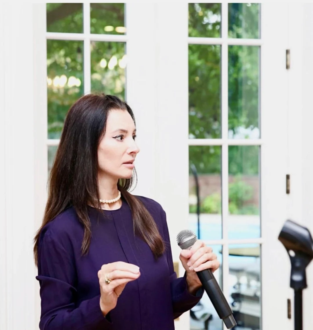 Adriana Trandafirescu speaking at an event