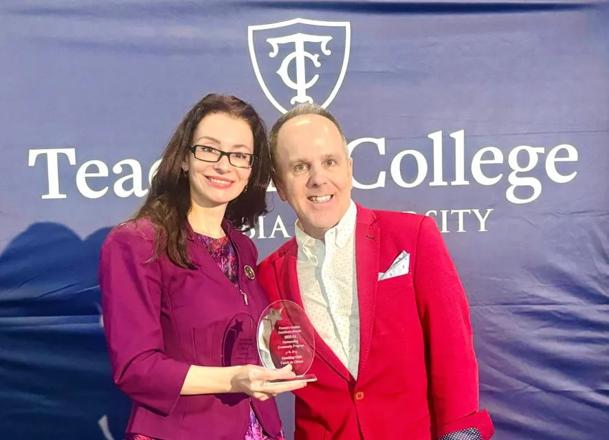 Adriana receiving recognition at Teachers College